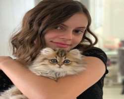 Celeste is an animal lover and has a cute cat in her home.